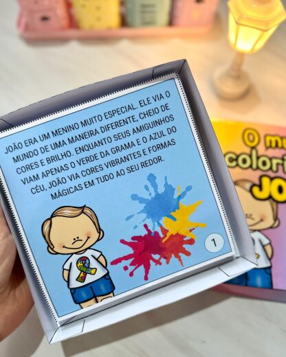 📦💙 História na Caixa - O Mundo Colorido de João 🌍✨| Dia Mundial de Conscientização do Autismo - Image 2